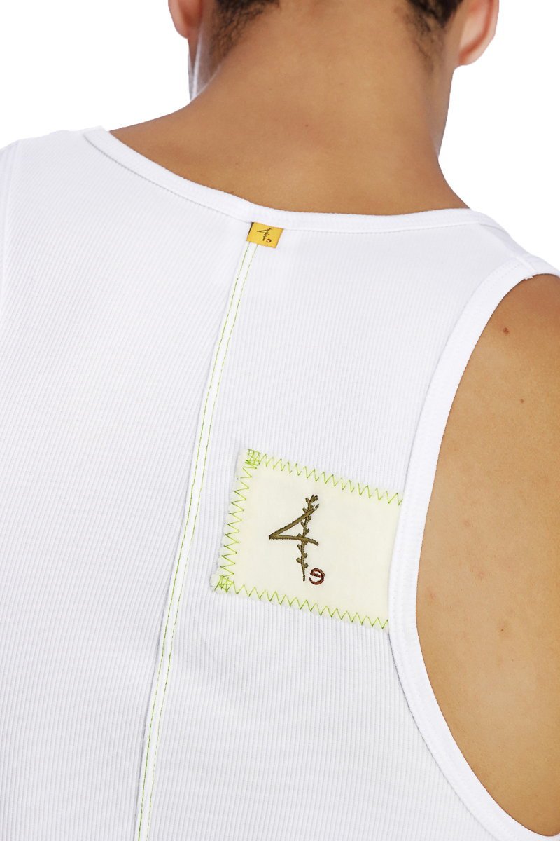 White ribbed sleeveless edge sustain tank top with cream patch and black embroidery accented by lime green stitching