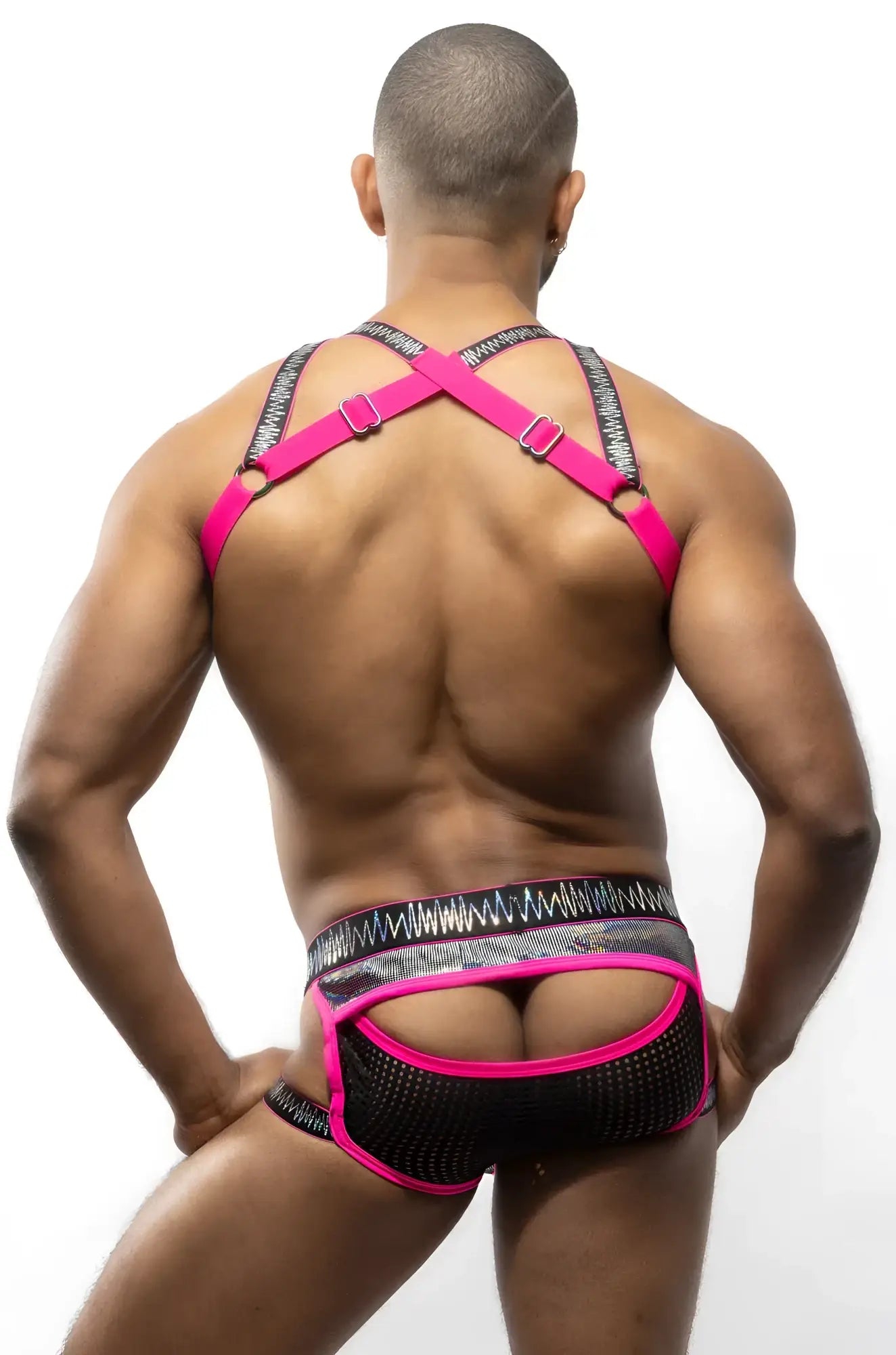 Bright pink and black mesh harness underwear with a bold patterned waistband from electro holographic harness collection