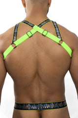 Neon green electro holographic harness with black patterned straps and metallic buckles showing front view