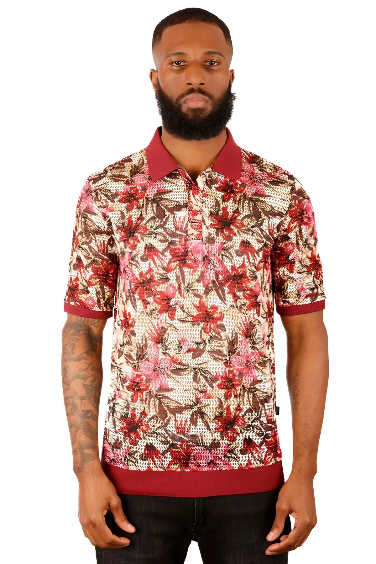 A man wearing an Entwine Form polo shirt with vibrant red and brown floral pattern on light beige fabric with maroon trim