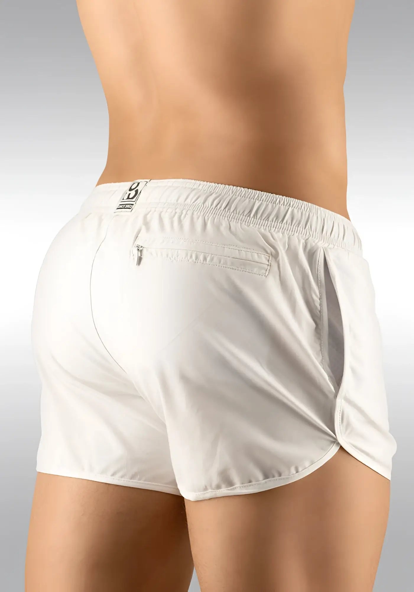 White ergowear built in feel bikini mesh gym shorts with elastic waistband side pockets and logo on the back in size m