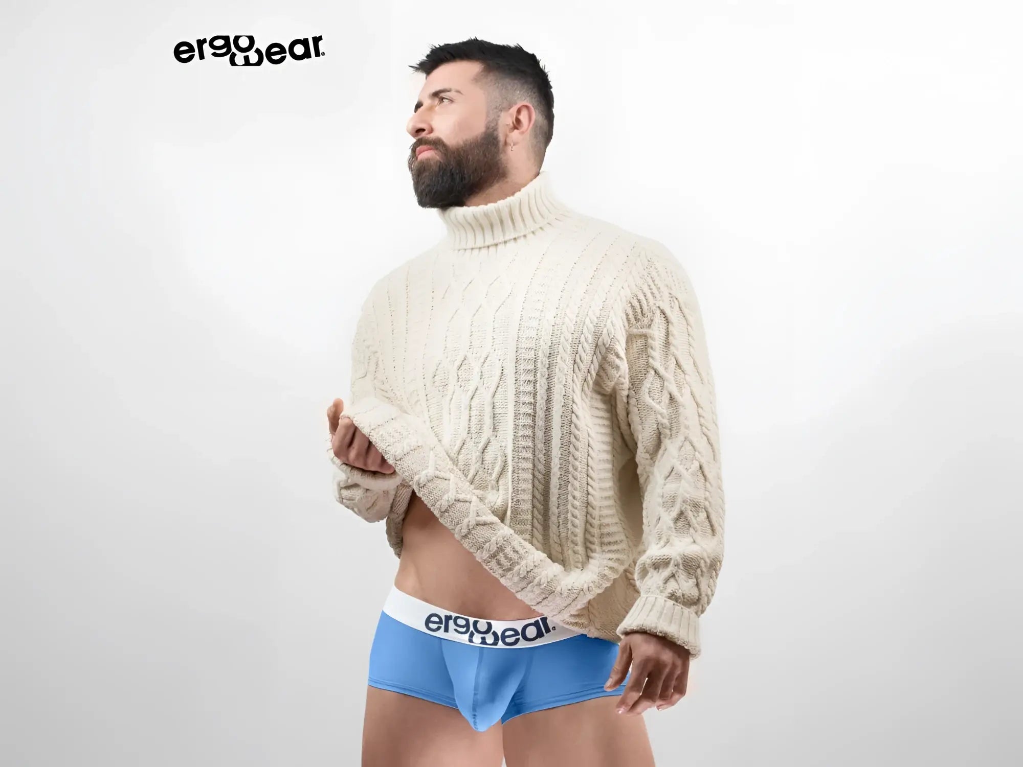 Cream-colored cable-knit turtleneck sweater from ergowear paired with light blue max cotton trunks model ew1713
