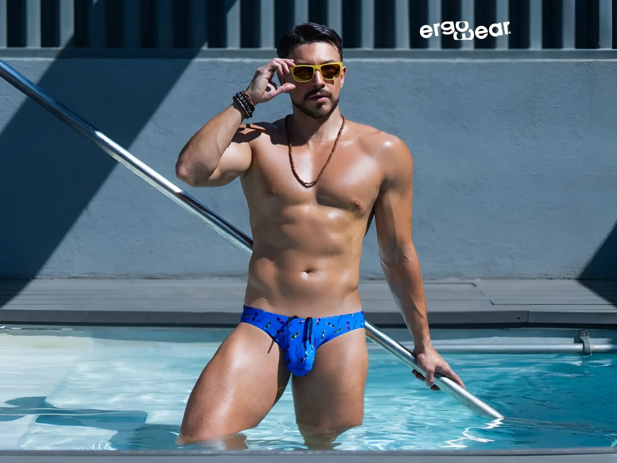 Blue patterned ErgoWear EW1767 X4D SW swim briefs in blue sunglasses color designed for comfortable swim use