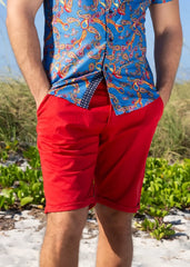 Bright red essential cotton short made of smooth fabric with neatly cuffed hems available in 4 colors