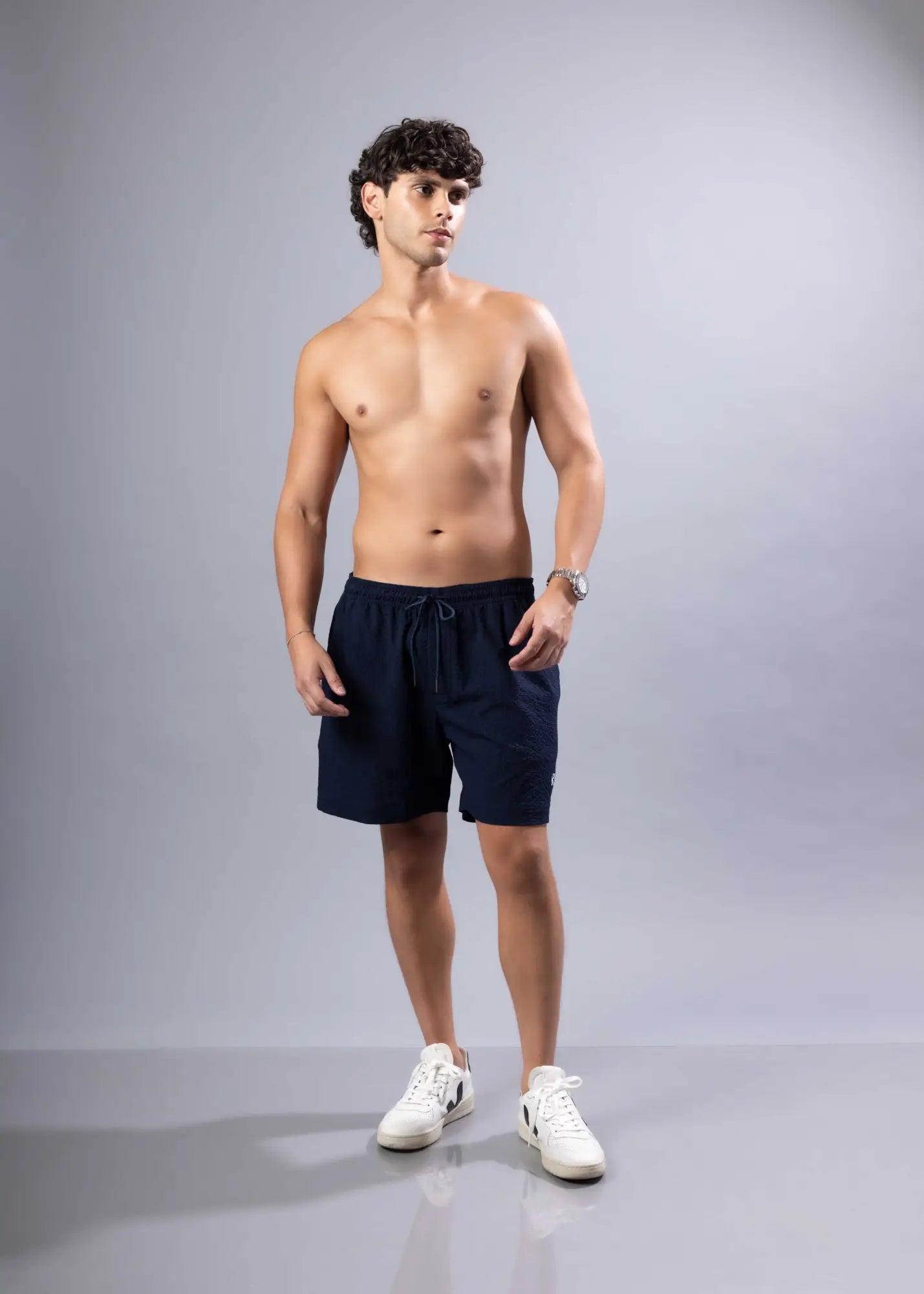 Navy blue essential swim shorts with drawstring waistband made for comfortable water activities available in 3 colors