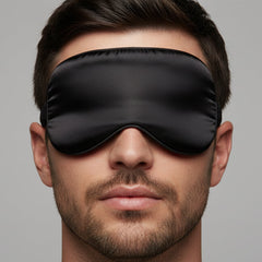 Black satin sleep mask with smooth glossy finish and elasticized edges by MetroMaleWear silky eye mask