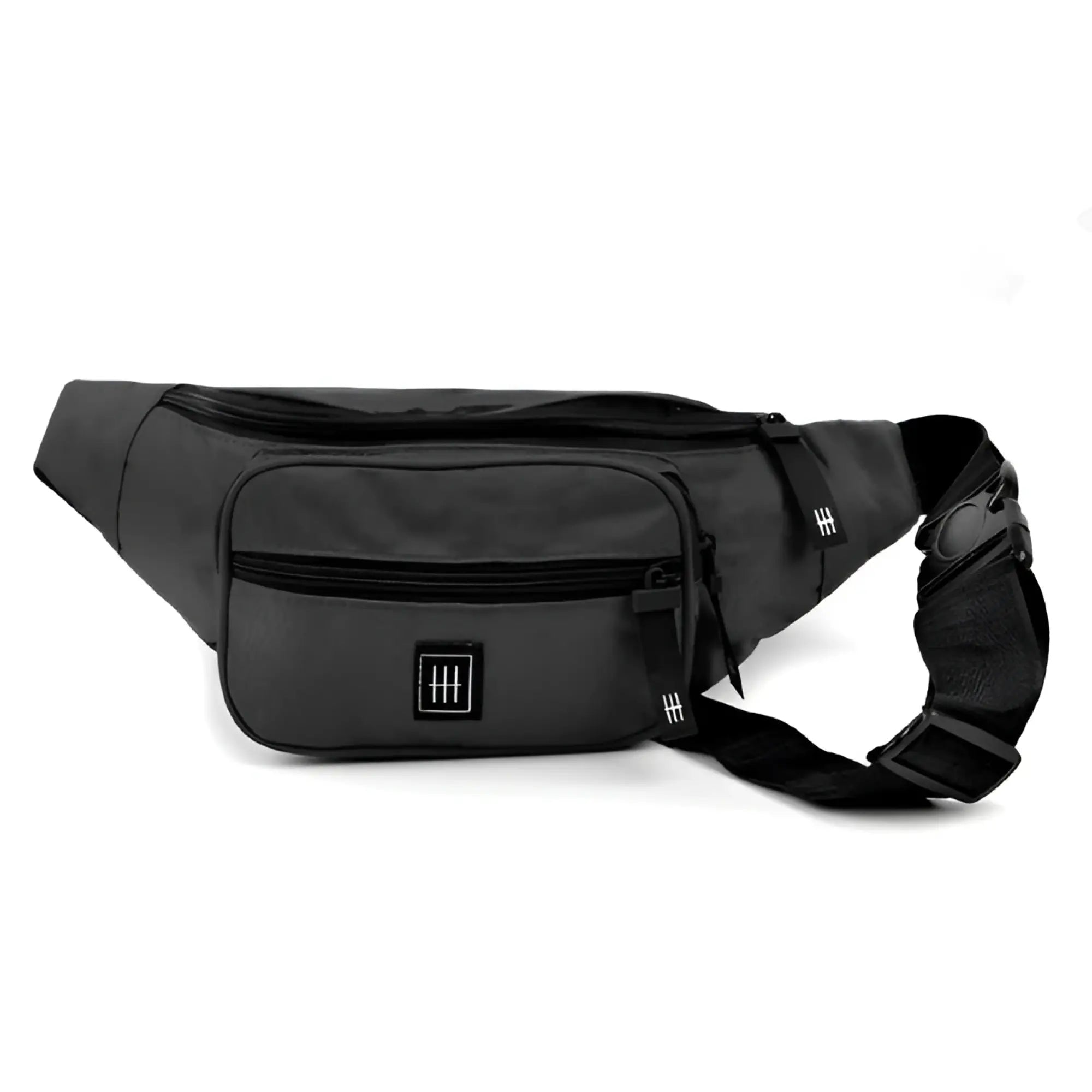 Black nylon fanny pack with multiple zippered compartments and a branded logo patch for convenient carrying