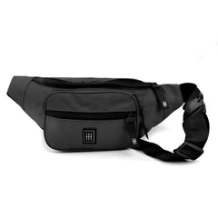 Black nylon fanny pack with multiple zippered compartments and a branded logo patch for convenient carrying