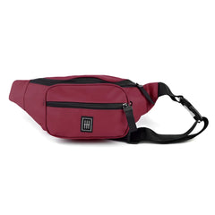 Maroon nylon fanny pack with black zippers and minimalist logo patch for hands-free carrying
