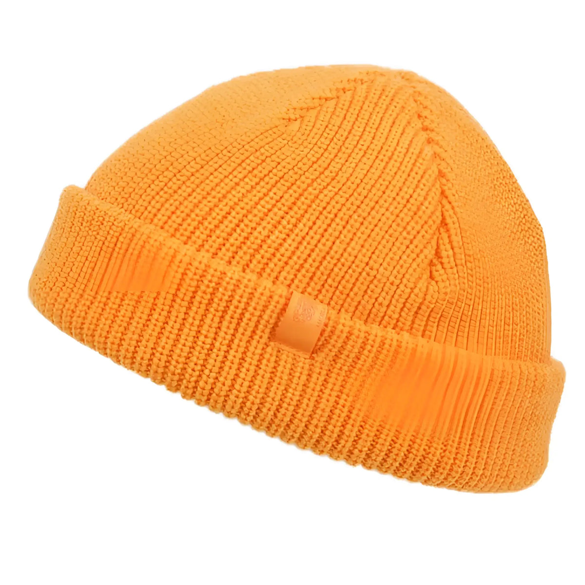 A vibrant orange ribbed knit fisherman dock knit cuff beanie with folded cuff and matching fabric tag visible