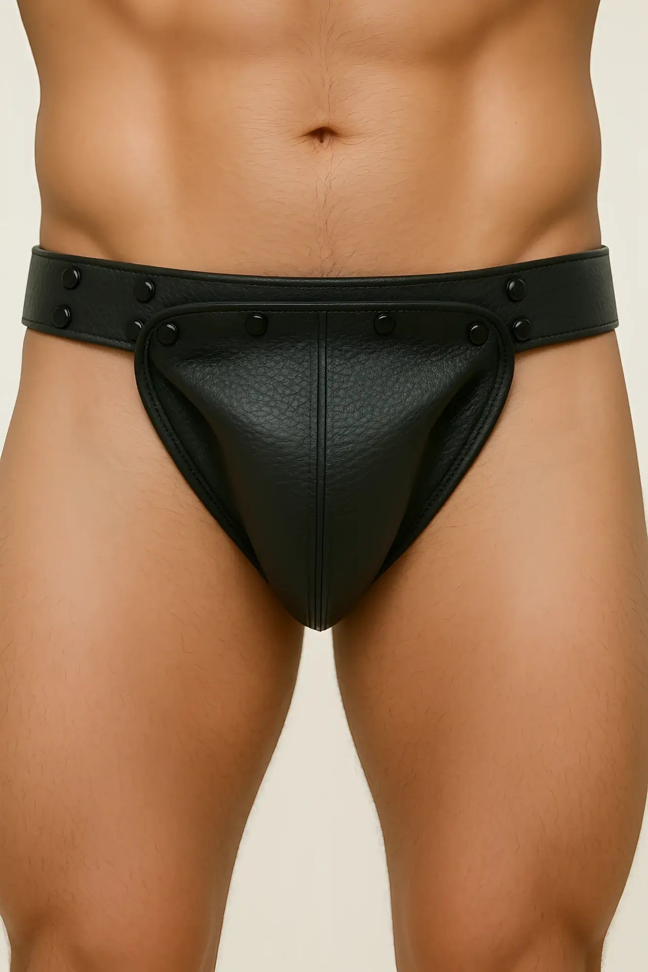 Black leather fizx jockstrap briefs with textured surface and decorative black studs along the waistband