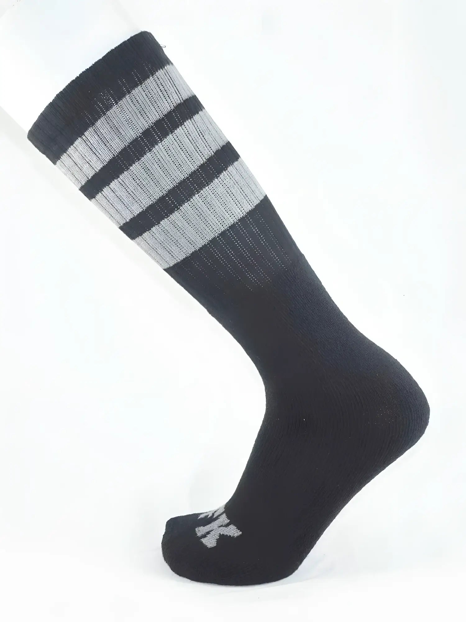 Fk sport black tube sock with ribbed texture and three horizontal stripes on the top cuff