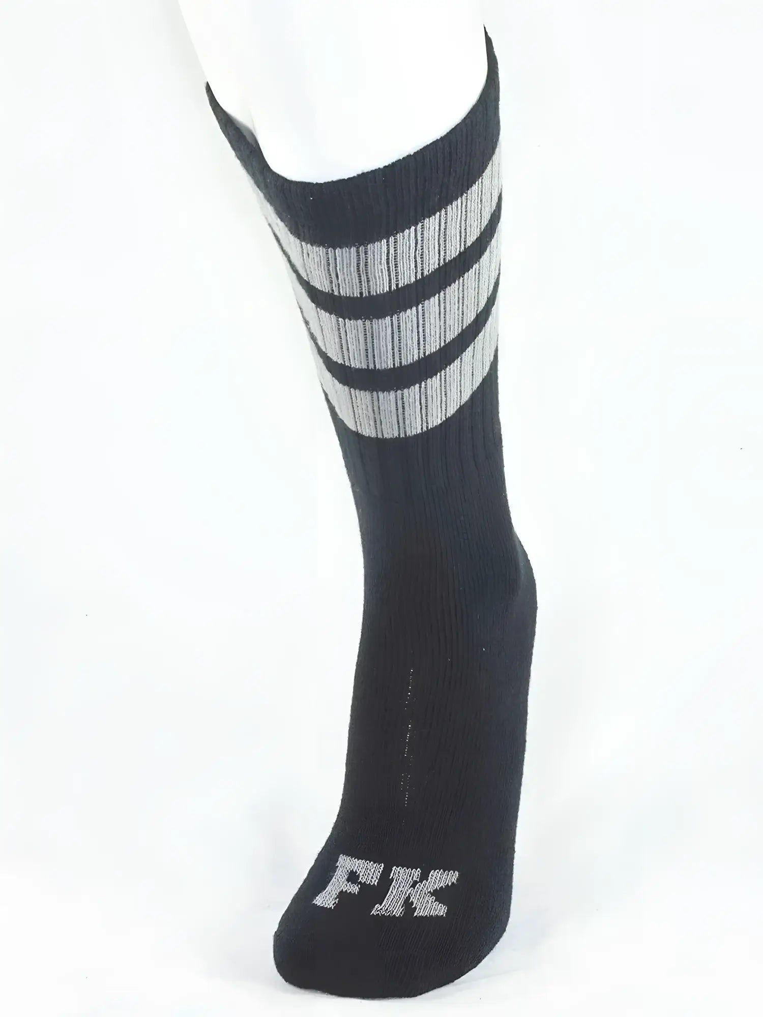 Black athletic tube sock with three gray stripes near top and silver fk logo embroidered on the toe for sports use
