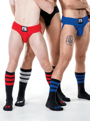 Red and blue FK branded ribbed briefs matched with FK Sport black tube sock for athletic use