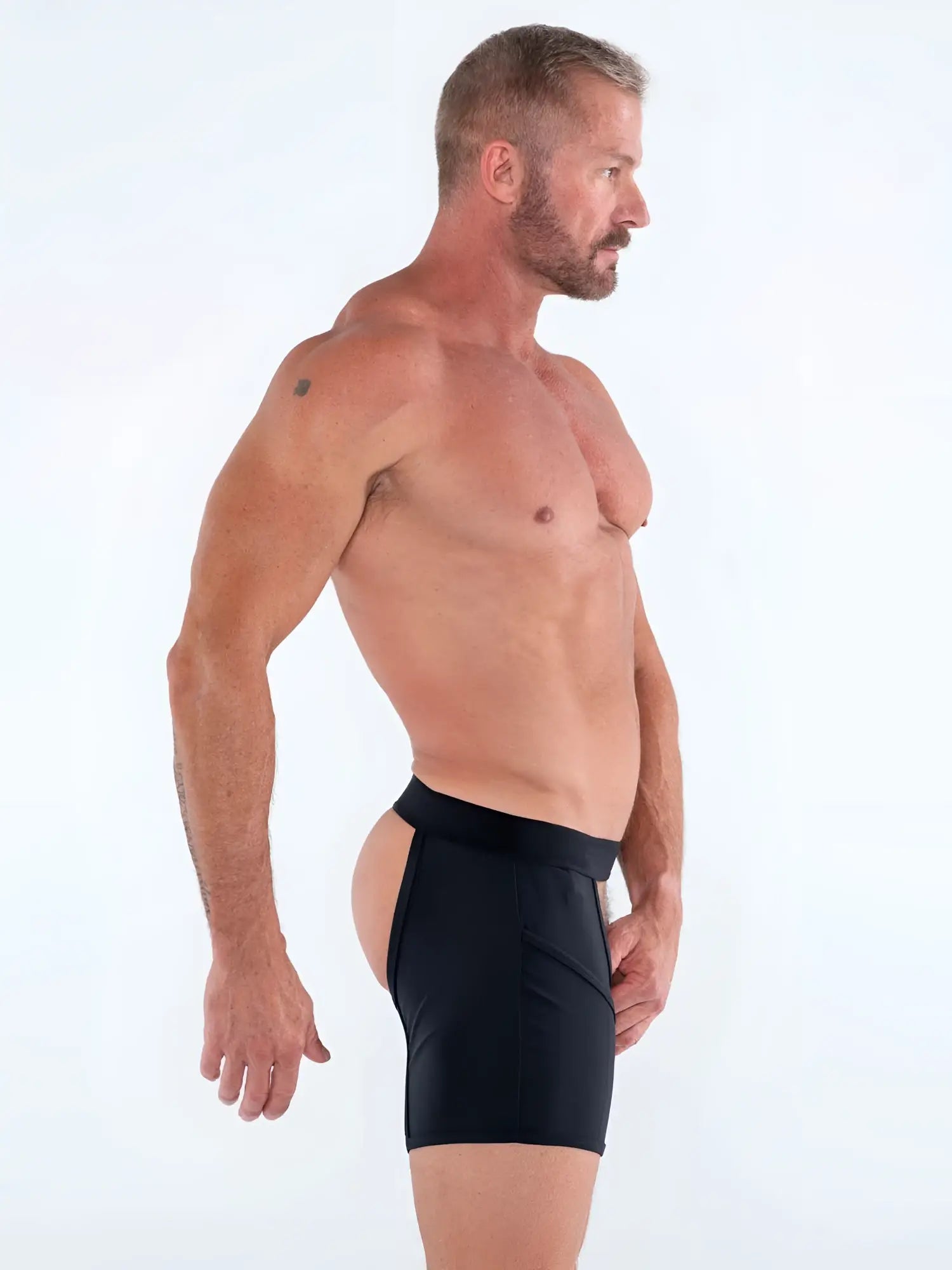 Black high-waisted sleek form-fitting athletic shorts by FK SPORT CACHE CHAPS for activewear and workouts
