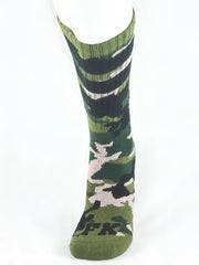 Green camouflage sport sock with black and white stripes and fk logo on the foot for athletic use