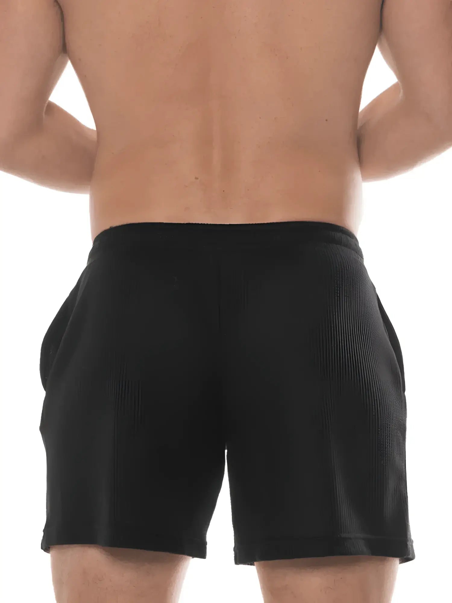 Black fk sport swinger shorts with ribbed texture and side pockets designed for athletic use