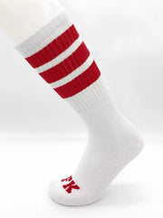 Fk sport white tube sock with three bold red stripes near the top and a small red logo on the toe