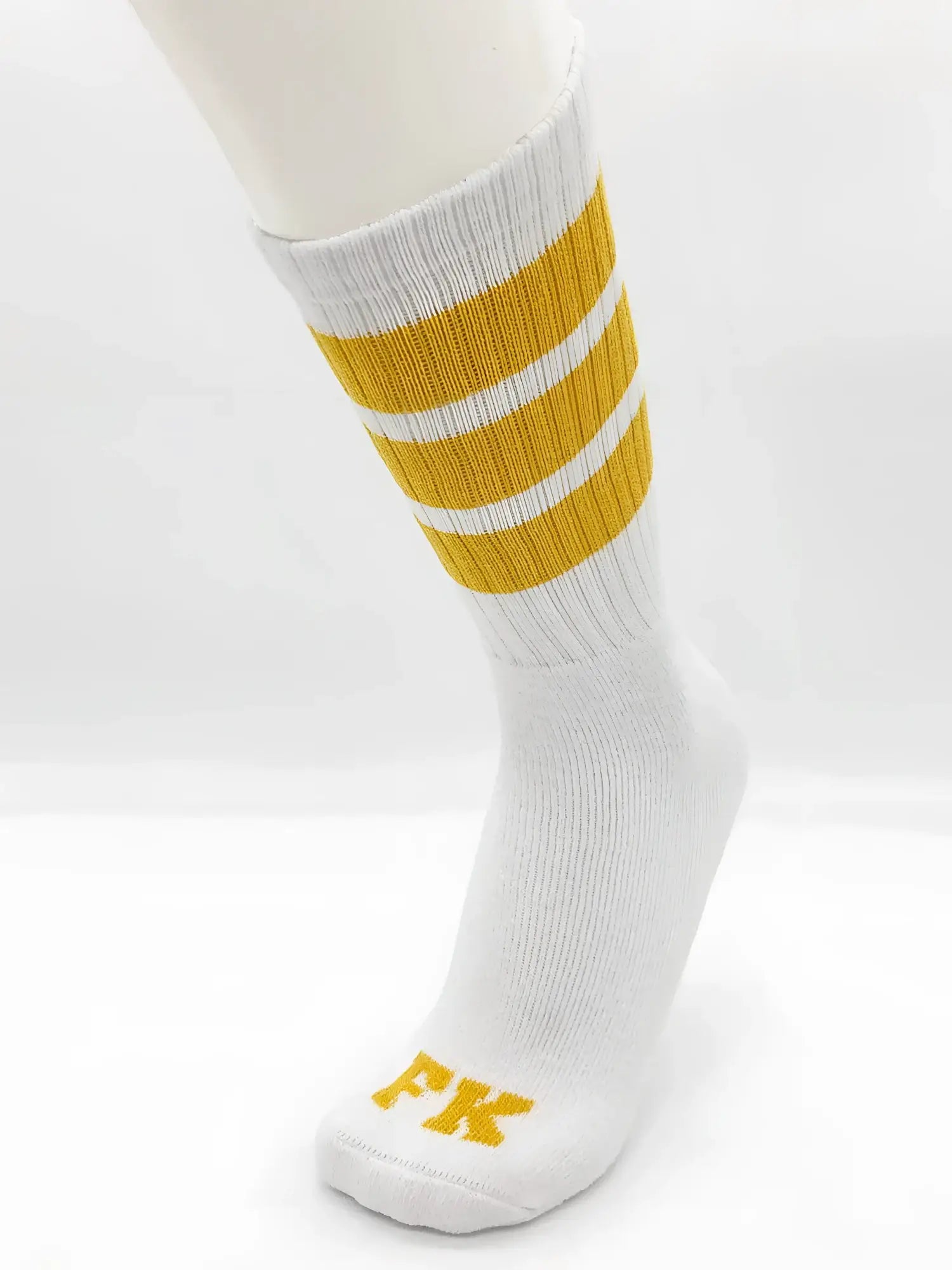 Fk sport white tube sock with three horizontal mustard yellow stripes and matching embroidered fk logo on the toe