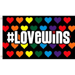 Black flag with rainbow hearts and bold white text love wins for pride and equality celebration displays