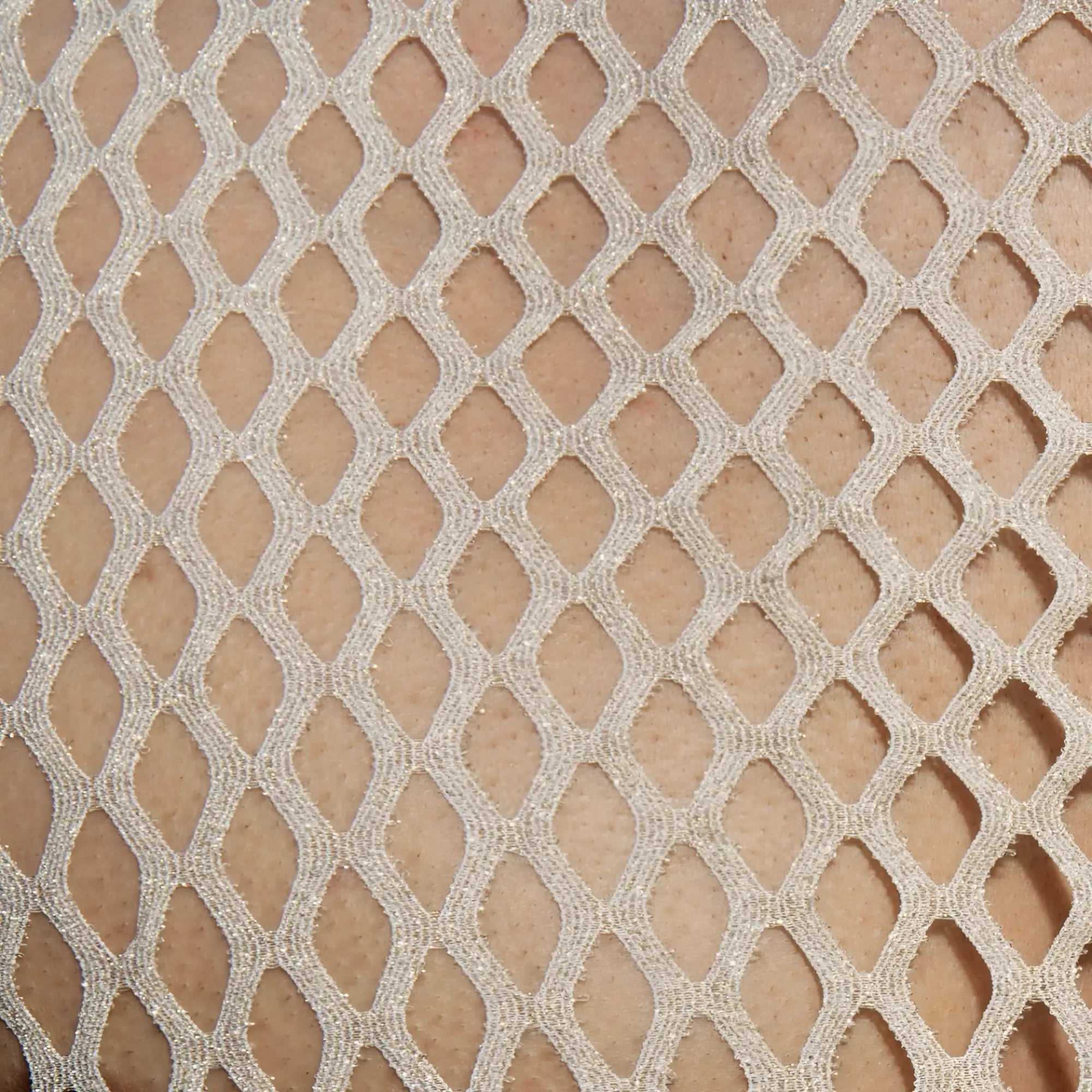 Flamboyant tank top featuring delicate shimmering silver mesh fabric with a diamond-shaped pattern