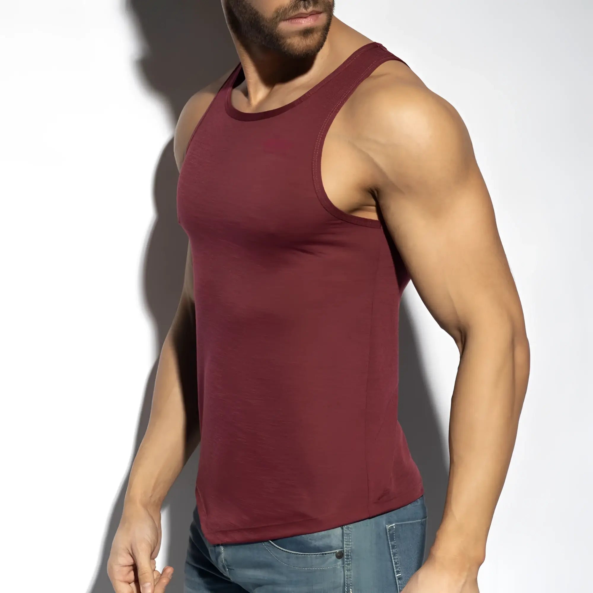 A maroon flame tank top sleeveless made of soft stretchy fabric with a round neckline and clean seams