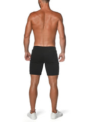 Black fleece flex-cotton stretch shorts with sleek form-fitting design ideal for athletic performance