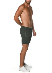 Dark green fleece flex-cotton stretch shorts with sleek design and zippered side pocket for athletic use