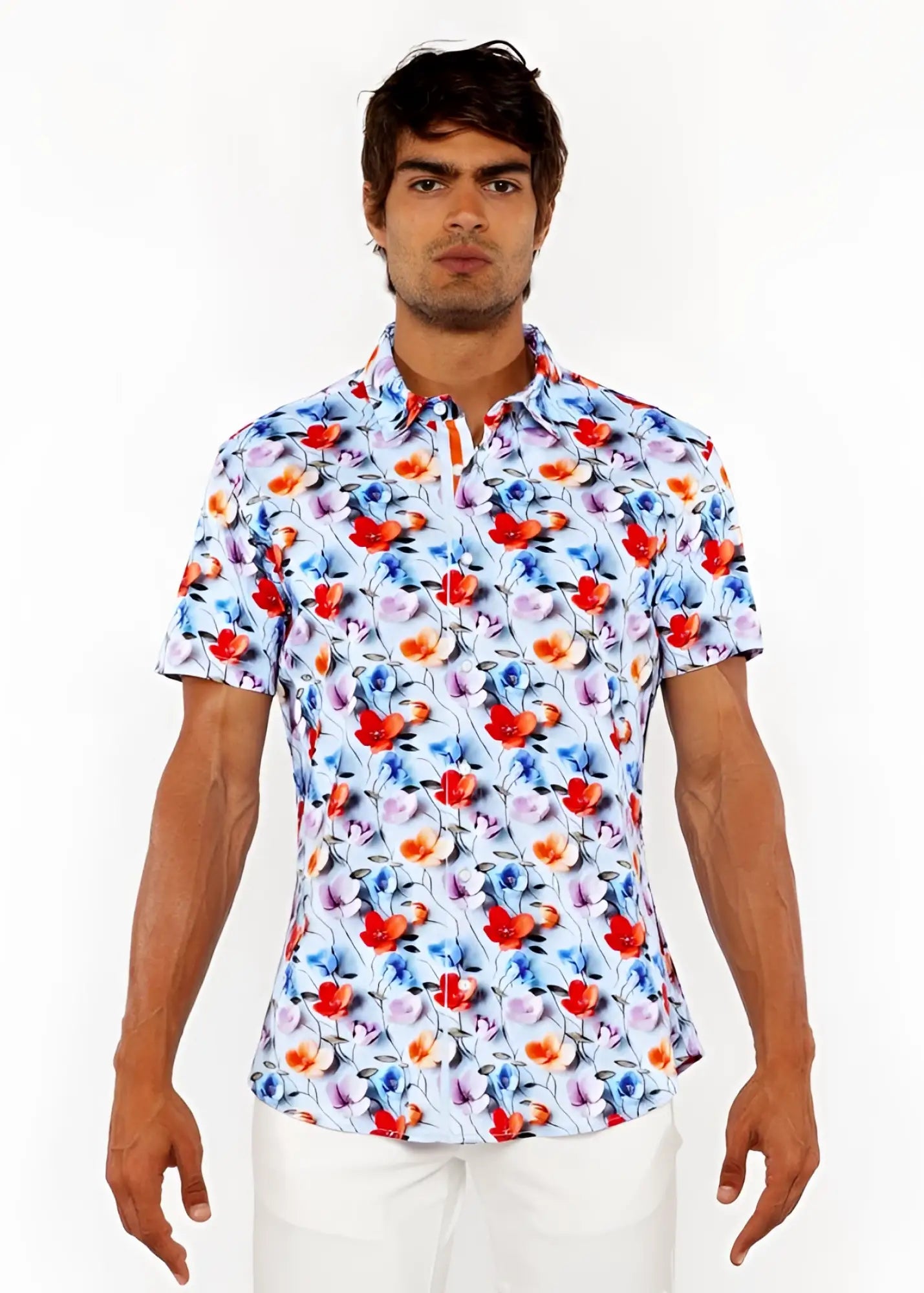 A vibrant white floral 3D print stretch knit shirt with bold red and blue blossoms and pink accents