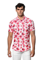 A man wearing a floral print open knit short-sleeved button-up shirt with vibrant pink flowers on white background