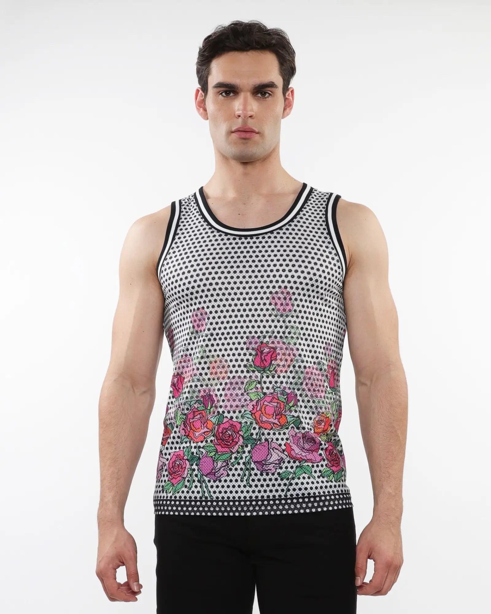 A men’s sleeveless mesh tank top with black and white polka dots and vibrant pink red purple roses and stripe ribbing