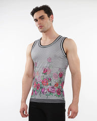 A men’s sleeveless floral printed mesh tank with pink and red roses on black and white polka dots with stripe ribbing