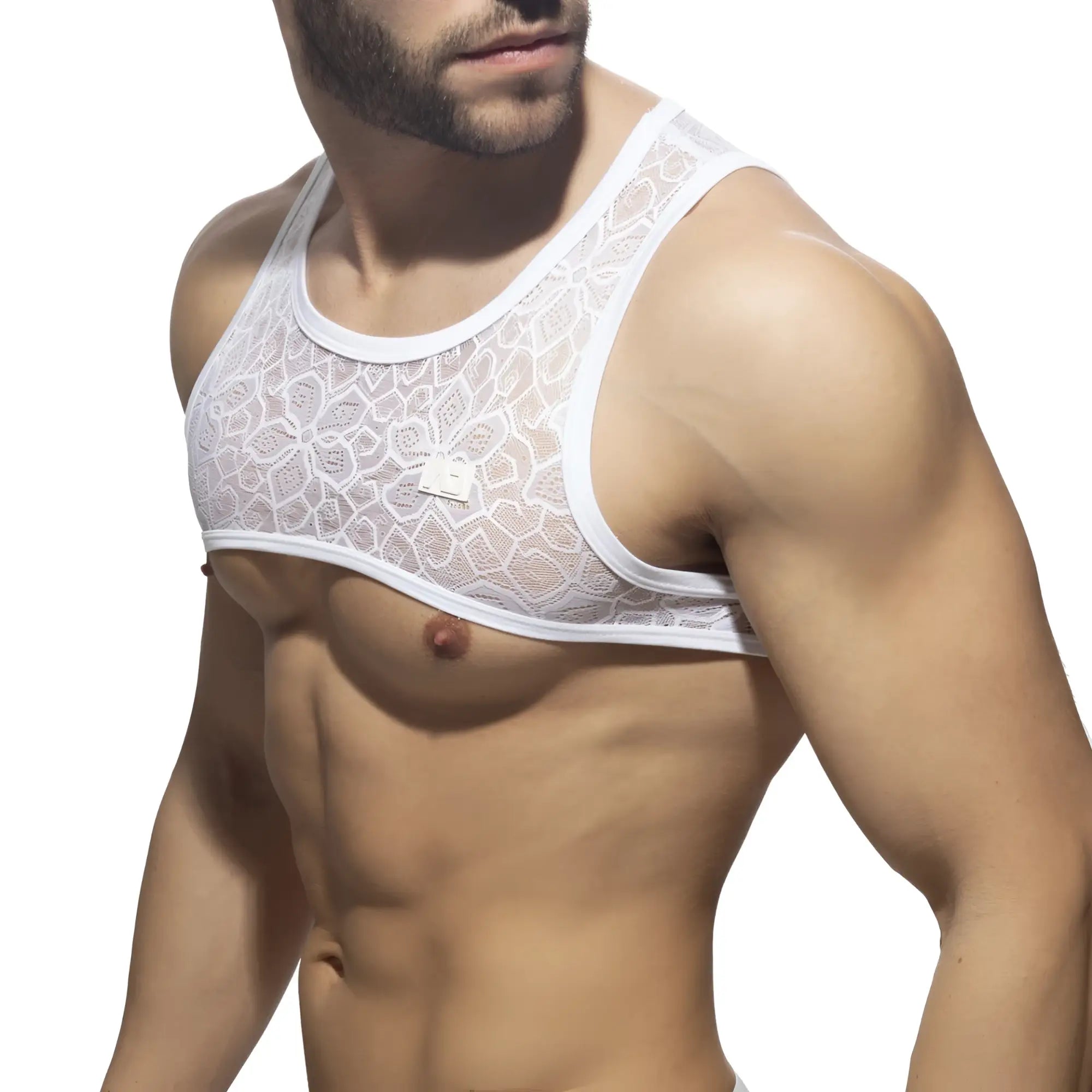White lace tank top with floral pattern and thin straps from the flowery lace harness collection