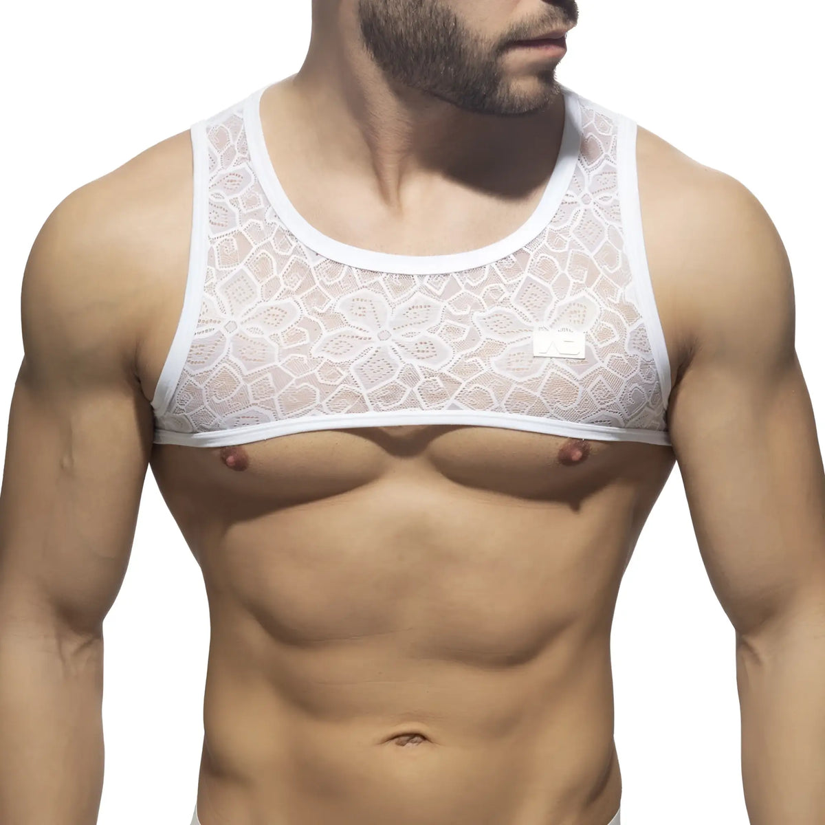 White lace tank top with floral pattern and solid white trim from the flowery lace harness collection