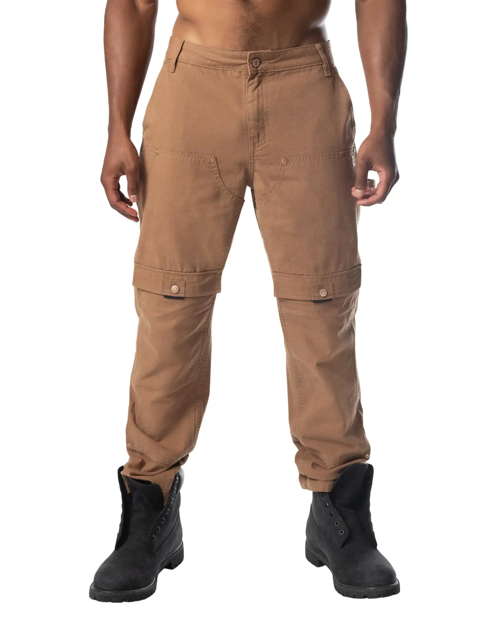 Tan forge pant cargo pants with multiple pockets and buttoned flap details for durable utility wear