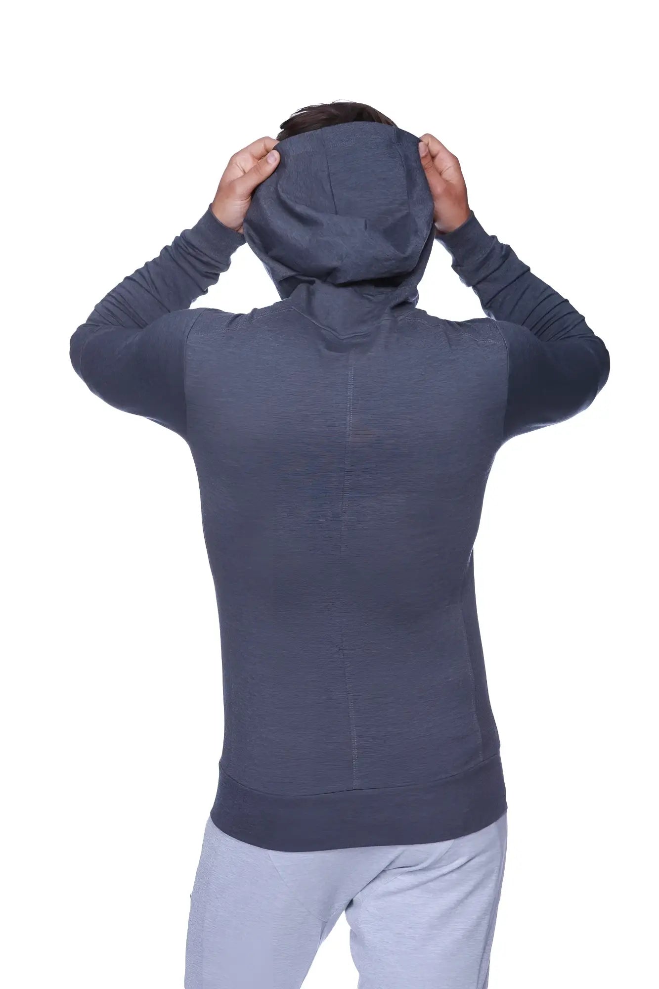 Dark gray form-fit crossover yoga track hoodie with textured fabric and long sleeves for performance use