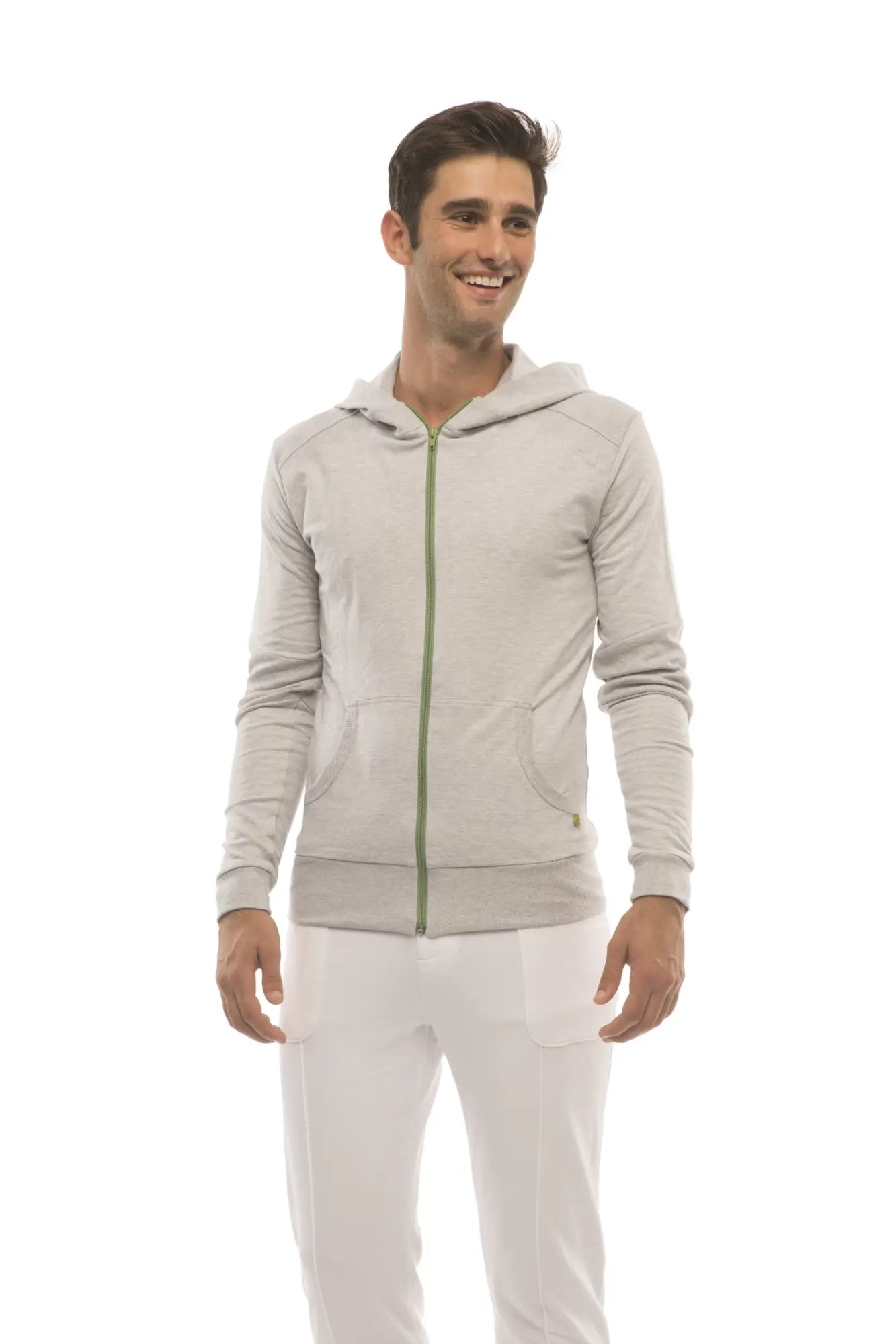 Form-fit crossover yoga track performance hoodie in heather gray with subtle textured fabric and contrasting green zipper
