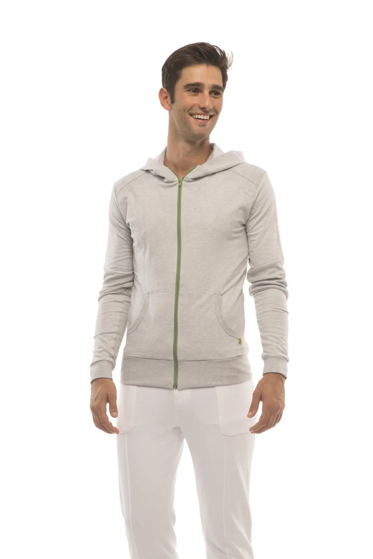 Form-fit crossover yoga track performance hoodie in heather gray with subtle textured fabric and contrasting green zipper