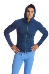 Form-fit crossover yoga track performance hoodie in navy blue with lime green zipper and white drawstrings for workout use