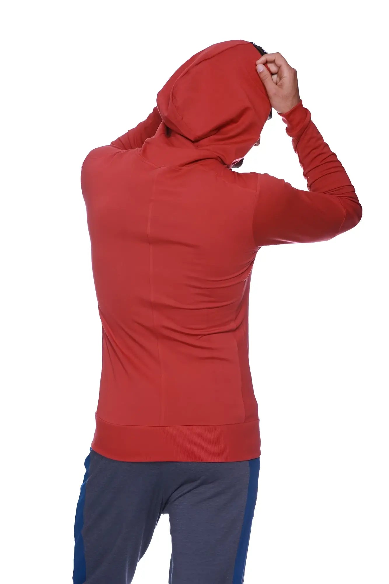 Form-fit crossover yoga track performance hoodie in solid cinnabar red with long sleeves and subtle seam detailing