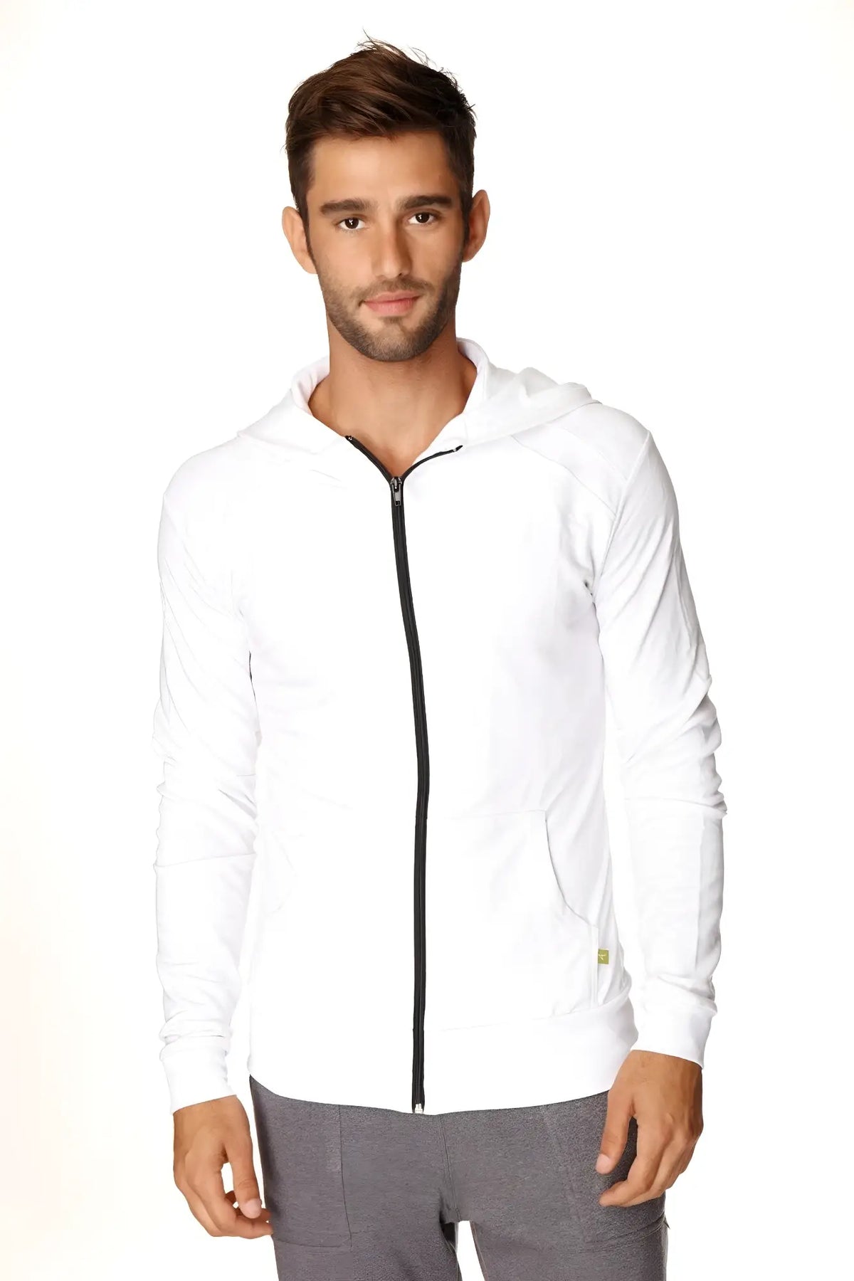 Form-fit crossover yoga track performance hoodie in white with black zipper and subtle side pockets for active wear