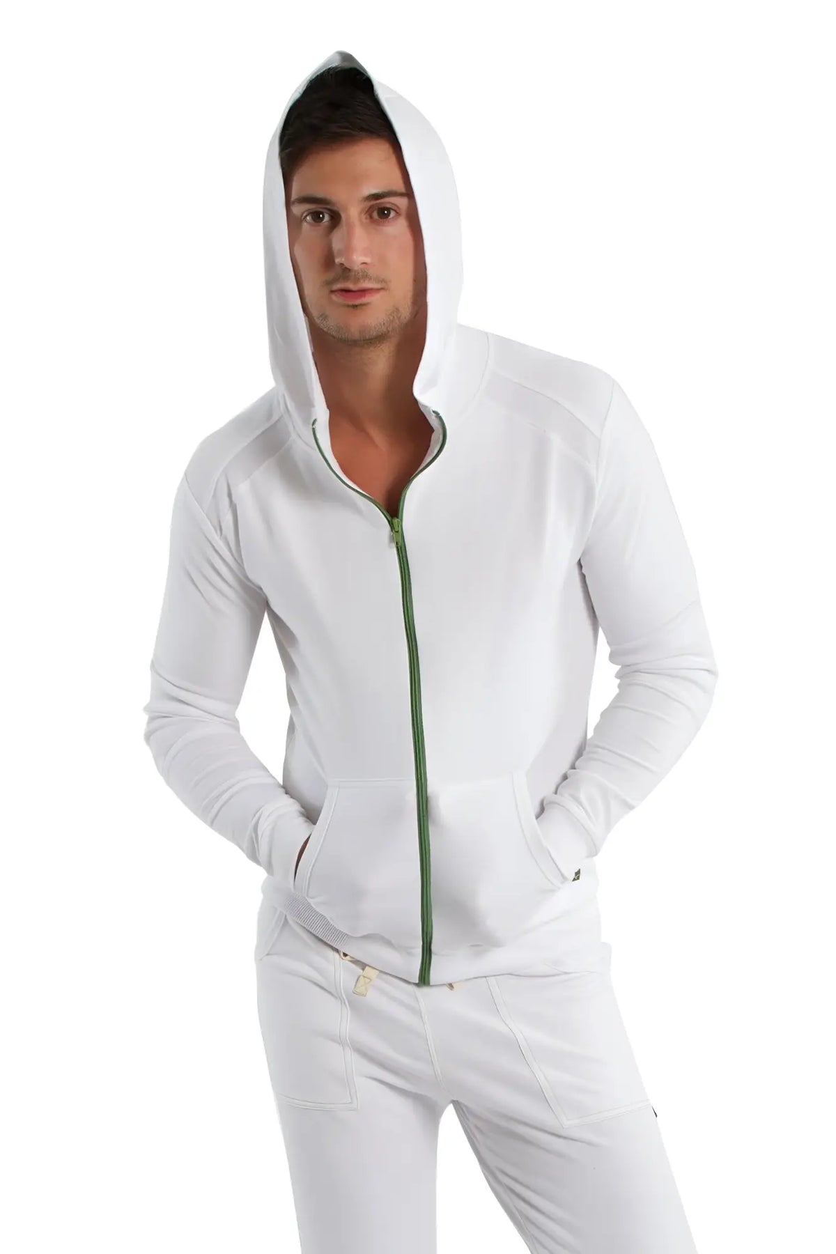 Form-fit crossover yoga track performance hoodie in white with green zipper and matching drawstring for activewear