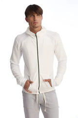 Form-fit crossover yoga track performance hoodie in white with a subtle green zipper and ribbed cuffs for comfort