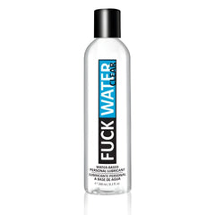 Clear plastic bottle with black cap and blue and black label reading fuck water clear water-based personal lubricant