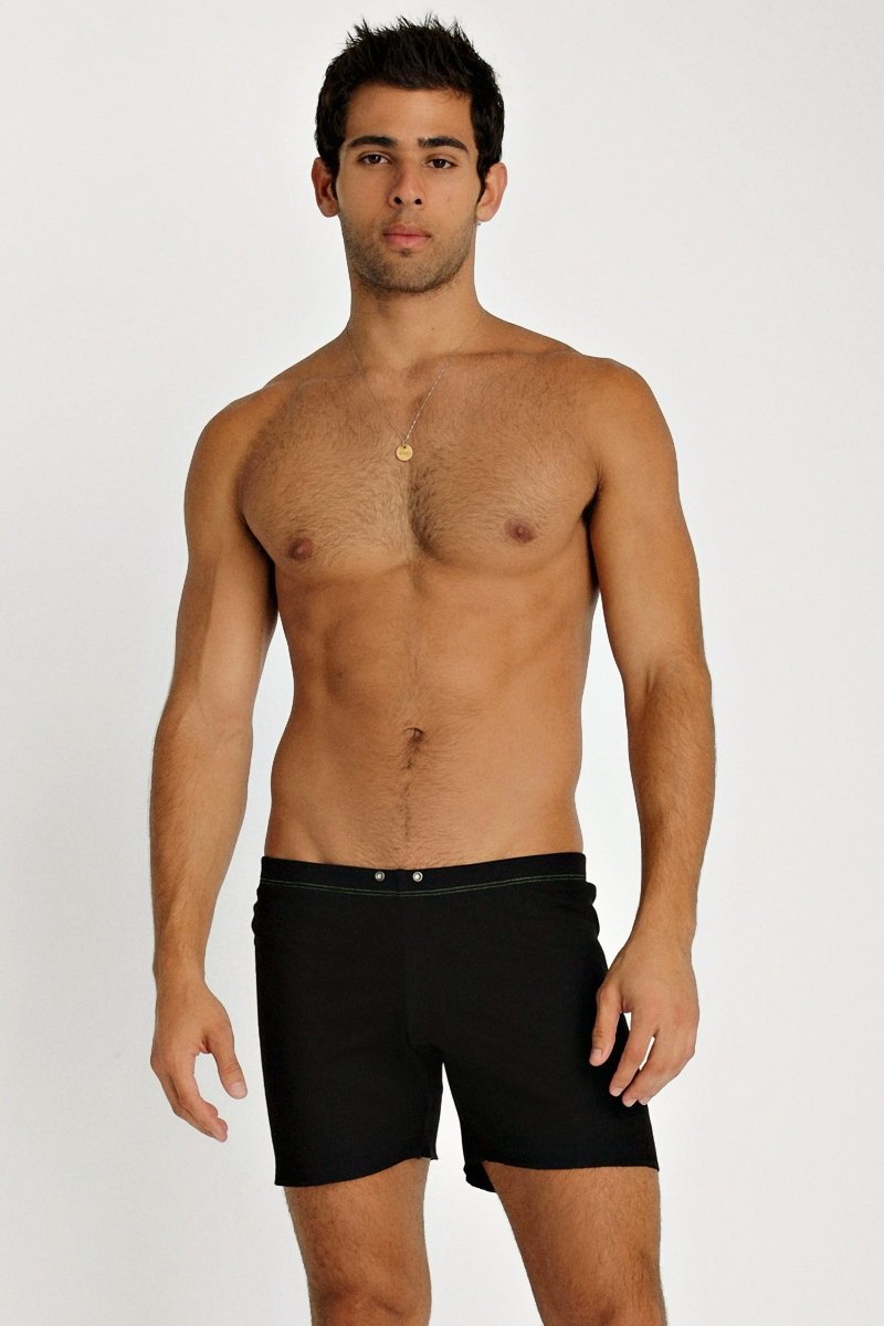 Black fusion yoga short swim trunks with sleek modern design and subtle waistband stitching for active wear
