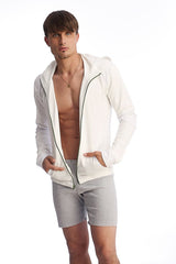 White zip-up hoodie with black zipper trim shown with heather grey fusion yoga shorts for active wear