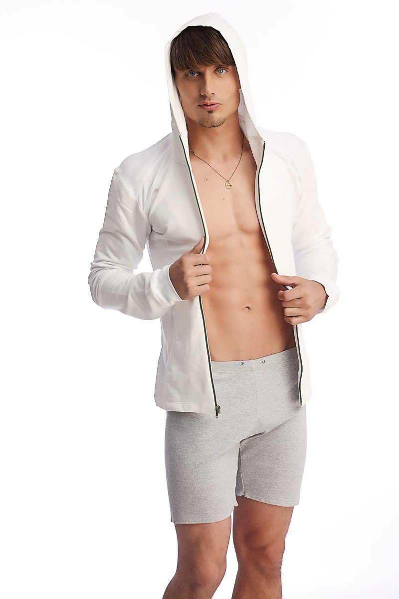 White hooded zip-up jacket with black zipper trim paired with heather grey fusion yoga shorts for athletic wear