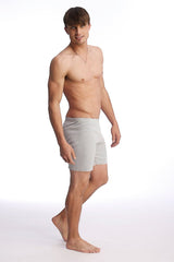 Light gray soft textured men’s Fusion yoga short briefs with subtle brand logo on the waistband