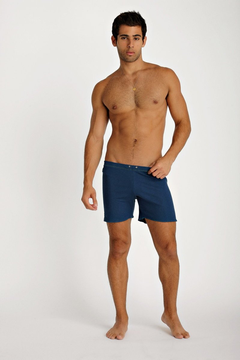 Navy blue fusion yoga short swim trunks with simple design and button closure at the waist for comfortable wear