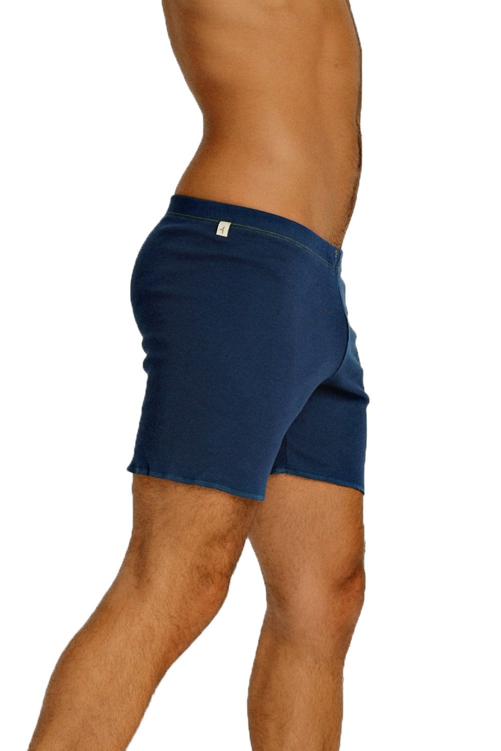 Navy blue cotton Fusion Yoga shorts with subtle elastic waistband and white brand tag on the backside